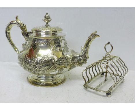 A silver plated teapot by Elkington &amp; Co., and a plated toast rack 