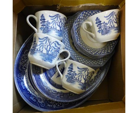 Blue and white china including six Willow pattern plates, four cups, saucers and side plates **PLEASE NOTE THIS LOT IS NOT EL