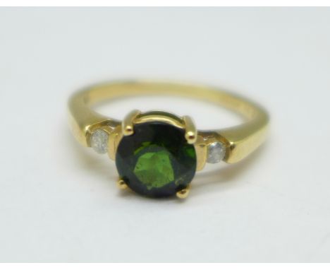 A 9ct gold, green stone and diamond ring, 2g, J 