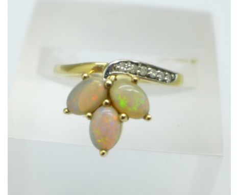 A 9ct gold, opal and diamond ring, 2.2g, L 