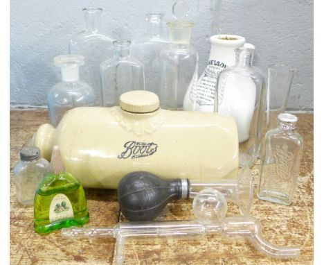 Pharmaceutical ceramics and glassware including a Boots ceramic hot water bottle, a Nelsons inhaler, six medicine bottles, va