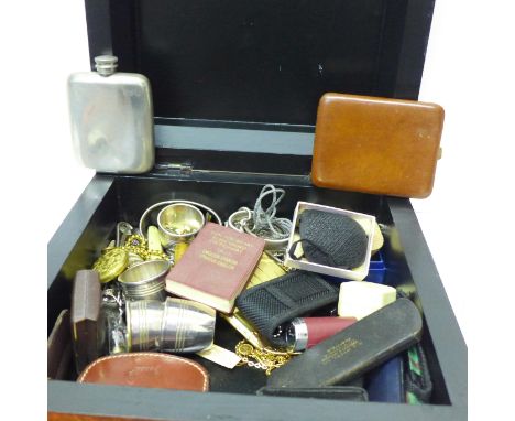 A mahogany box containing a plated flask, spectacles, jewellery, cigarette case, etc. 