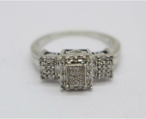 A 9ct gold and diamond triple square cluster ring, 4.2g, Q 