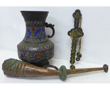 An oriental vase, a horn and a dagger made from Chinese coins 