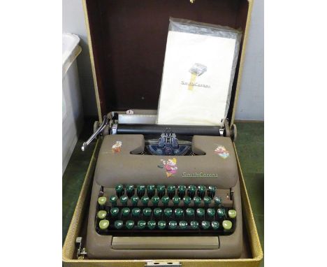 A Smith-Corona typewriter, boxed with instructions 