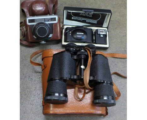 A pair of Greenkat 10x50 binoculars, a Werra camera and an Olympus XA2 camera and flash 