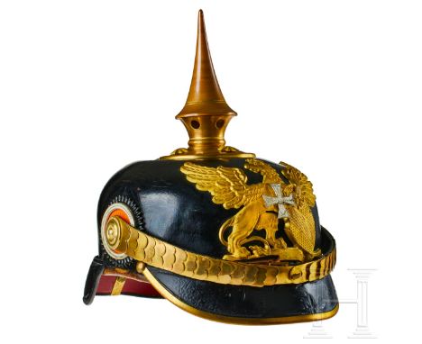A helmet for Baden Infantry Reserve Officers Black lacquered leather body; front visor with green underlay and rear visor wit