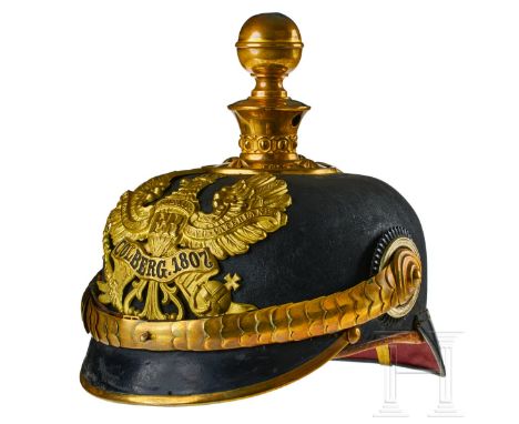 A helmet for Prussian Field Artillery Regt. 26 Battery 2 Officers Black lacquered leather body (dull); front visor with green