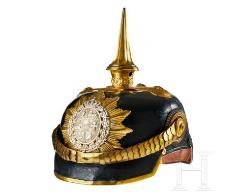 A helmet for DR 17 Mecklenburg Dragoon Officers Black lacquered leather body, front visor with green underlay, rear visor wit