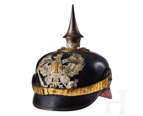 A helmet for Prussian Pioneer Battalion 10 Reserve Officers Black lacquered fiber body; front visor with green underlay, rear