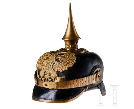 A helmet for Prussian IR 87 Officers Black lacquered leather body; front visor with green underlay, rear visor with red under