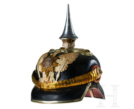 A helmet for Oldenburg 19th Dragoon Regiment Reserve Officers Black lacquered leather body; front visor with tan underlay, re