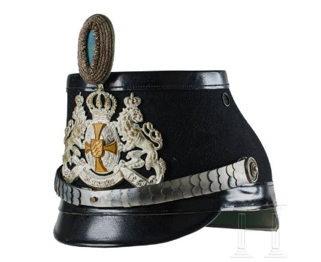 A shako for Bavarian Telegraph Reserve Officers Black felt covered body with black leather front and rear visors; silver fron