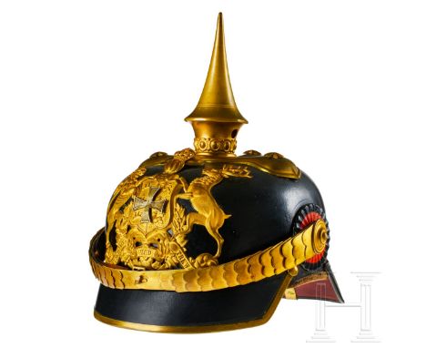 A helmet for IR 122 Württemberg Reserve Officers Black lacquered leather body; front visor with green underlay, rear visor wi