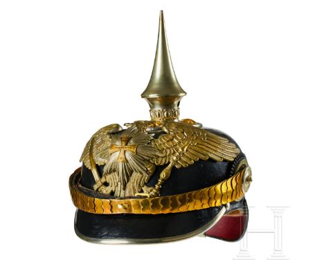A helmet for Prussian Guard Grenadier Landwehr OfficersBlack lacquered leather body (depressed behind eagle head); front viso