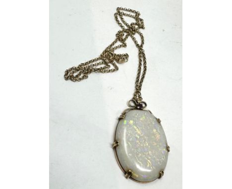 9ct gold large opal pendant necklace weight 10g opal measures approx 3.1cm by 2.3cm,
