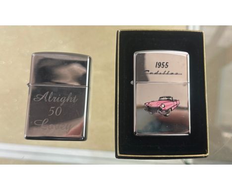 2 Zippo lighters, one boxed