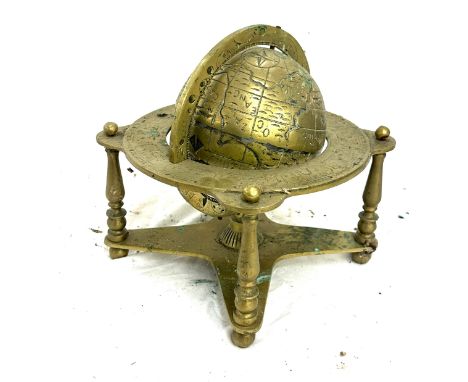 Vintage brass globe measures approx 12 inches tall by 9 wide