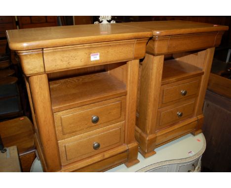 A pair of contemporary light oak round cornered bedside chests Condition Report / Extra Information Both stand well  and are 