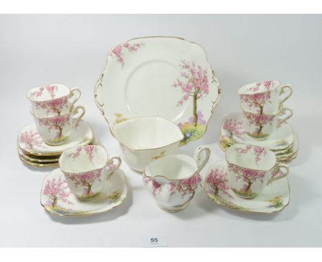 A Standard vintage tea service 'Spring Time' comprising: six cups and saucers, six tea plates, milk and sugar and cake plate 