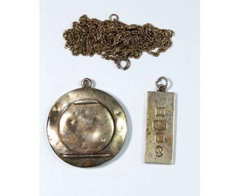 A silver ingot, silver miniature compact- a/f and two silver chains 