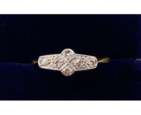 An Edwardian 18 carat gold and platinum set diamond ring with original box, 2g, size K 