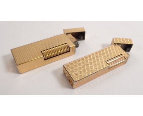 A Dunhill gold plated lighter and a Prince one 