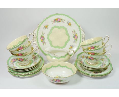 A Royal Albert Pompadour vintage tea service comprising: six cups and saucers, six tea plates, cake plate, milk and sugar 