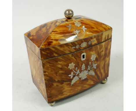 A fine 19th century tortoiseshell tea caddy with white metal and mother of pearl floral inlay, dome top lid with ball finial 
