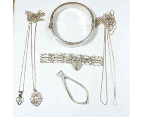 A silver gatelink bracelet, four silver necklaces, pendant and silver hinged bangle, 54g total 