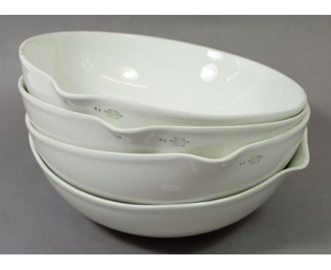 Four Royal Worcester porcelain evaporating dishes, 24cm diameter 