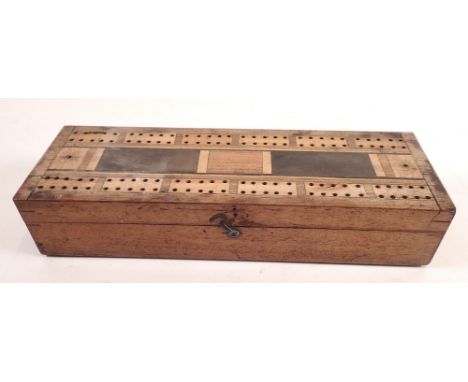 A 19th century marquetry cribbage board with card box within 