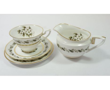 A Royal Worcester 'Bernina' part dinner and teaset comprising of thirteen trios, three various jugs and sugar bowls, one ture