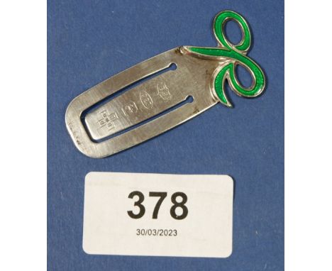 A silver and enamel ribbon book mark 