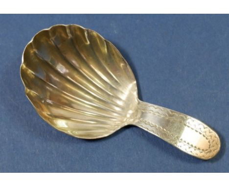A silver caddy spoon with fluted bowl and bright cut handle, London 1831 by George Wither
