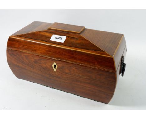 A 19th century rosewood tea caddy with ring handles and replacement fitted interior, 31cm wide 