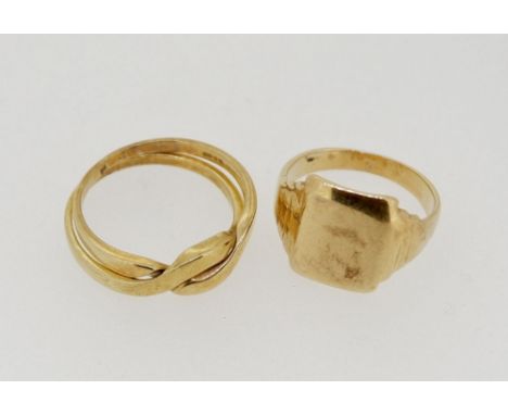 A 9 carat gold signet ring size L, 4g and a two part interconnecting ring, 3.7g, size N 