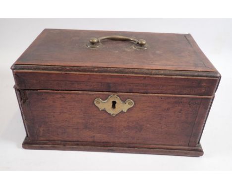 A Georgian mahogany rectangular tea caddy with brass handle and escutchecon fitted metal caddies and box to interior, 25cm wi
