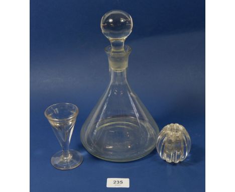 A glass decanter, 28cm, a small glass and a candlestick 
