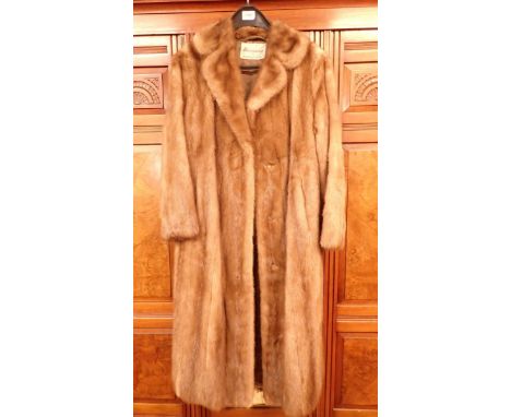 A pastel mink ladies fur coat with matching hat plus another hat by Harrisons of Worcester and two fox fur collars (including