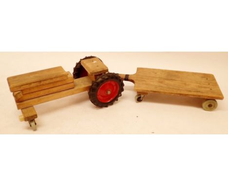 A Gerrards Cross Bucks Community ride on tractor toy and trailer (tractor measures 57cm long) 