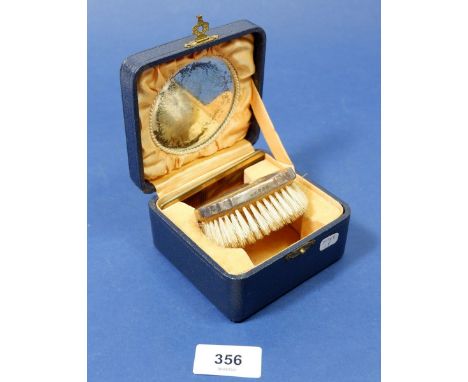 A silver baby's brush and comb, boxed, Birmingham 1926