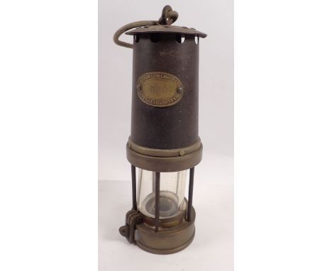 A Patterson Lamps Ltd miners lamp, stamped GPO 555 Type A3, Gateshead on Tyne, 26cm