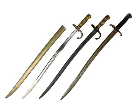 French Model 1866 sabre bayonet with 57cm fullered steel curving blade; in steel scabbard L71cm overall; another Model 1866 s