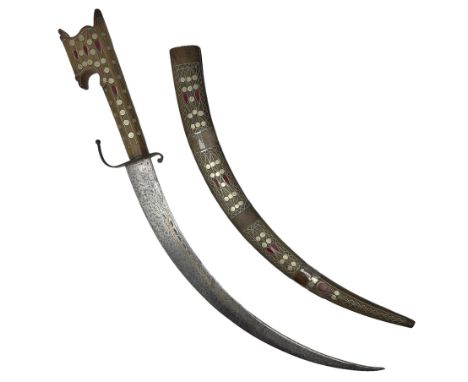 Late 19th/early 20th century Moroccan nimcha dagger-sword, the 40cm curving steel blade with engraved decoration on both side