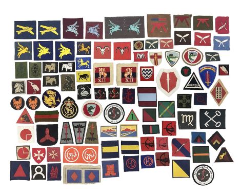 Approximately one-hundred printed and embroidered cloth badges including 3rd Indian Infantry, Chindits Hermes Wings, 6th Fiel