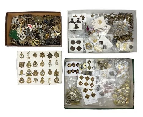 Large quantity of British military cap badges, shoulder titles, collar badges, rank pips, buttons etc, including original and
