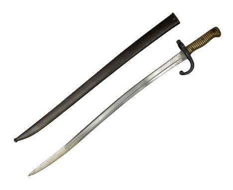 French model 1866 sabre bayonet, the 57.5cm curving blade marked St. Etienne 1868; in associated steel scabbard L71cm overall