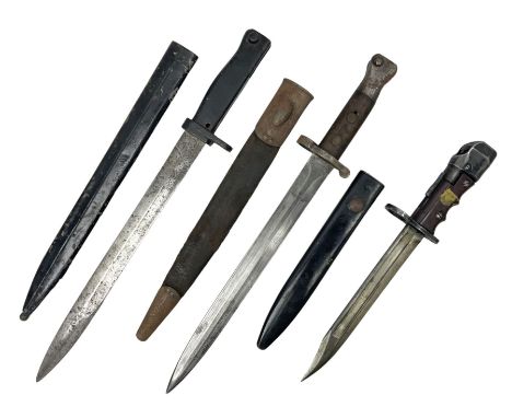 British No 7 MKI knife bayonet with 20cm single edged fullered clipped point blade;  blackened steel, large muzzle ring cross