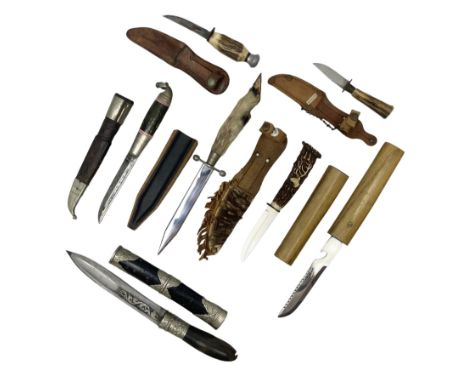 Eastern dagger with 14.5cm ornate fullered blade and nickel mounted horn grip; in nickel mounted ebonised wooden scabbard L25